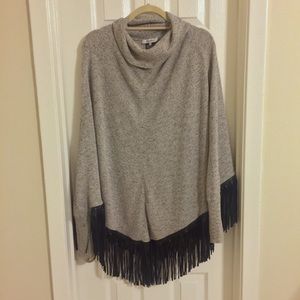 Fringe turtleneck poncho, with sleeves, by Zozo